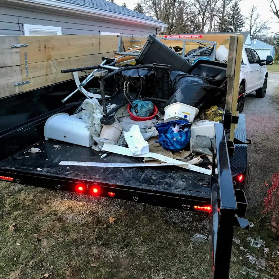 Roll-off dumpster delivered to a residential driveway in Arlington